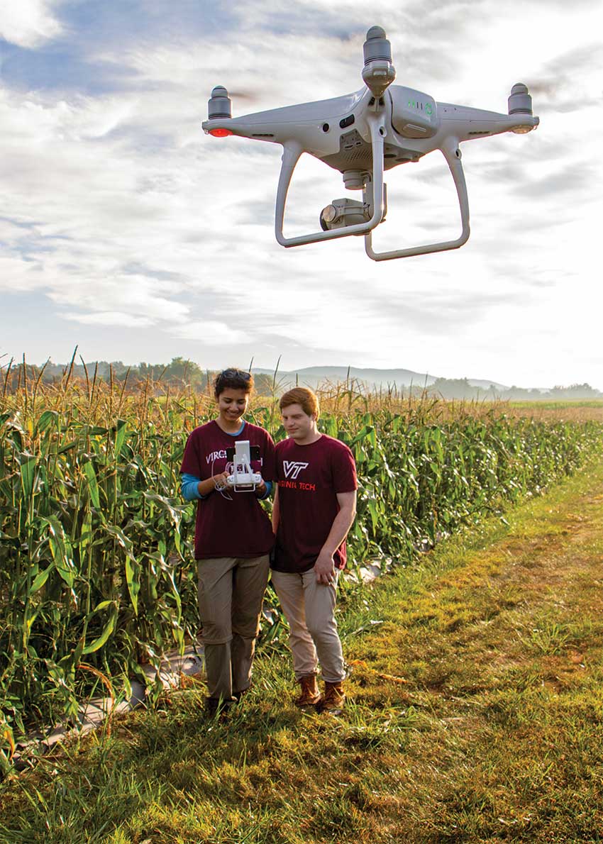 Virginia Tech students flying a drone