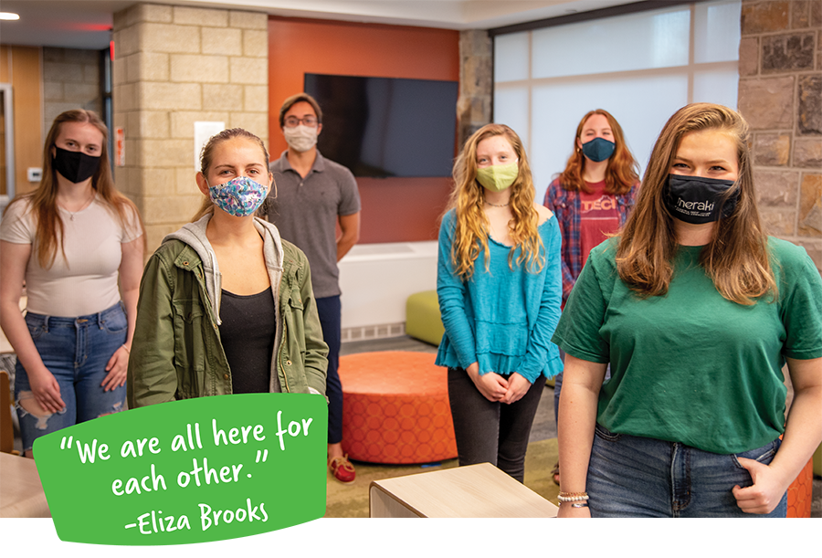 Image of a group of girls in COVID masks smiling, quote from Eliza Brooks: 'We are all here for each other.'